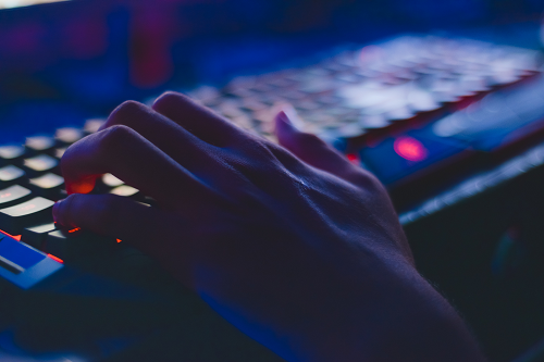 A person typing on a computer